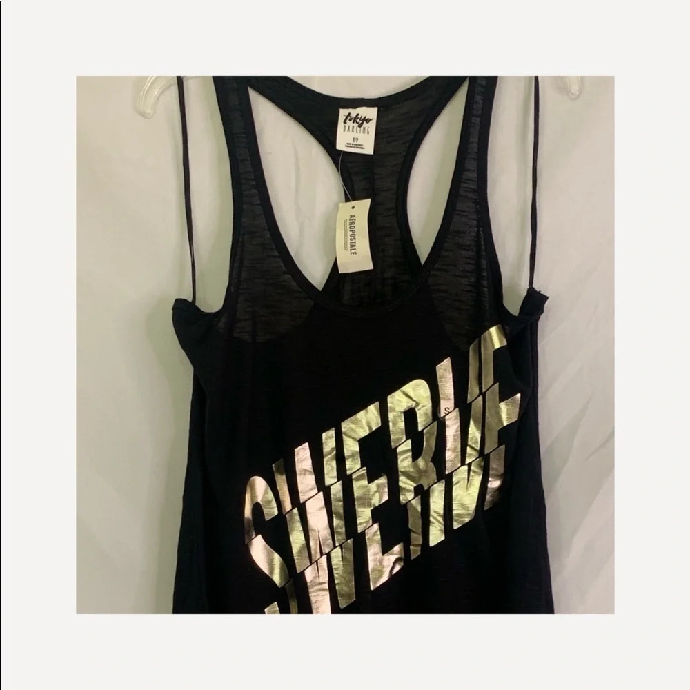"SWERVE Tank: High-Low Style, Size S | Gold Front | Effortless Chic!"
